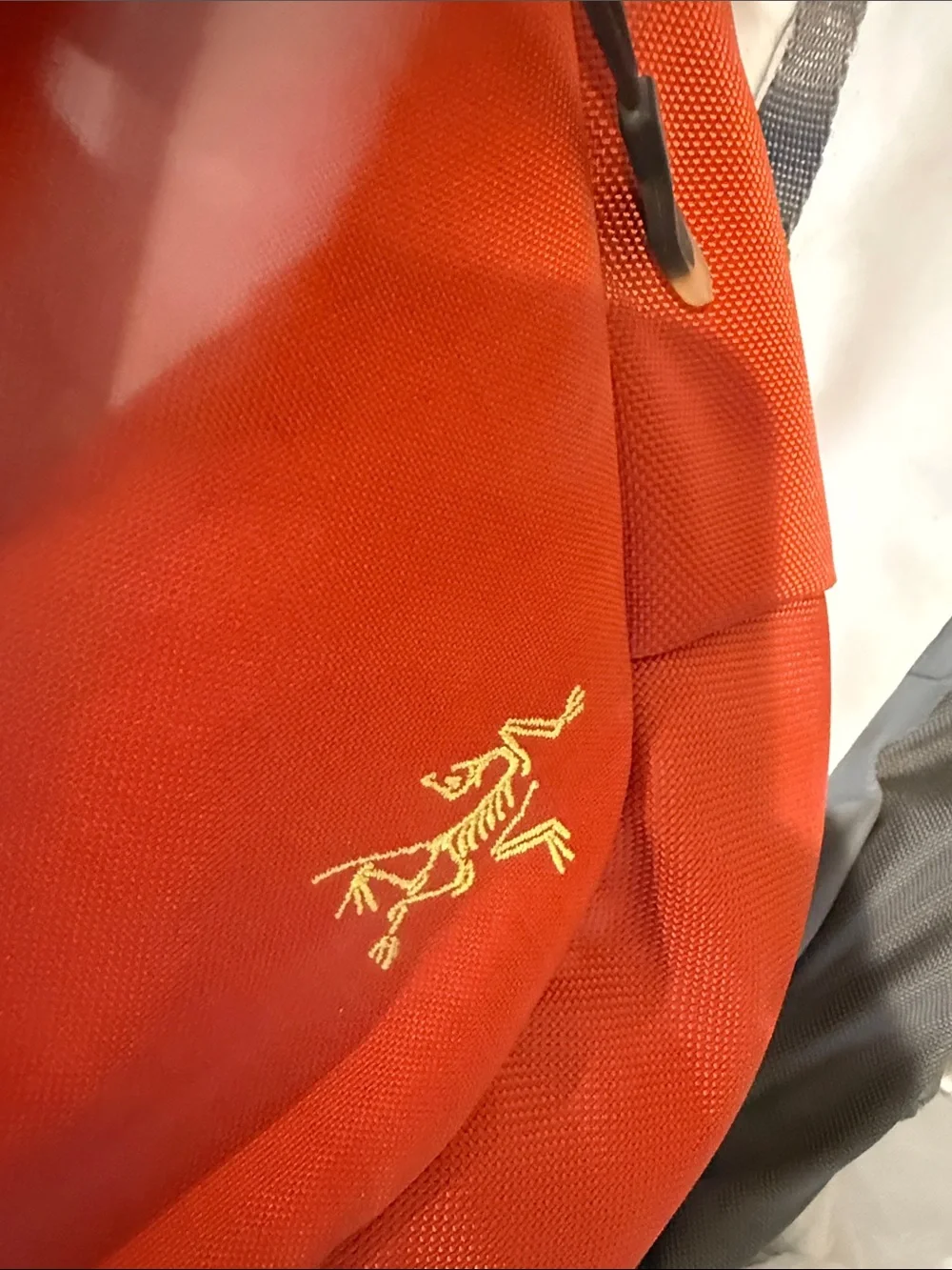 Arc'teryx Red Backpack with Yellow Accents